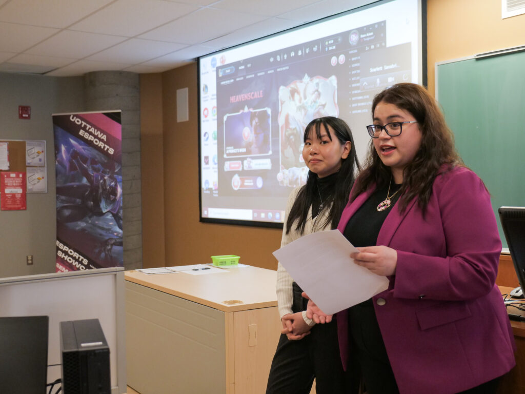 The Co-Presidents of uOttawa Esports Jessica Guo (left) and Scarlett Montserrat Sanabria-Ramos (right) address students at the launch of the week.